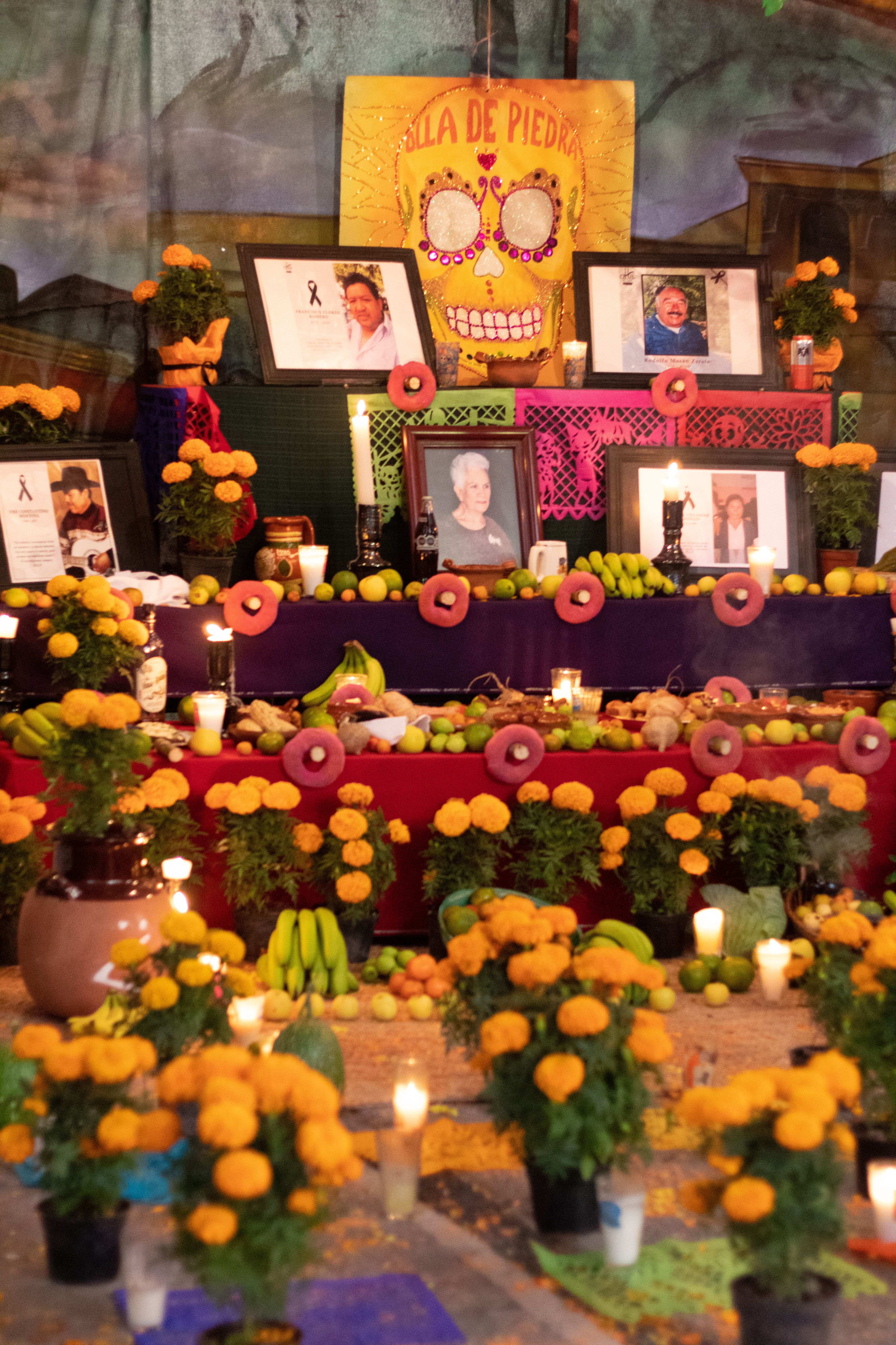 Colorful Día de Muertos altar with marigolds and candles in Mexico