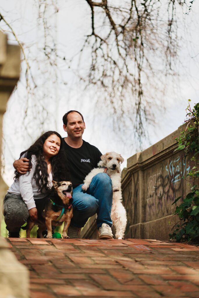A happy family with dogs enjoying a day outdoors in Montevideo, Uruguay.
